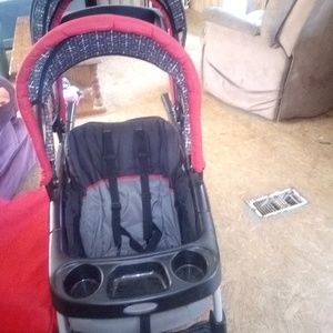 Boy clothes and toys stroller